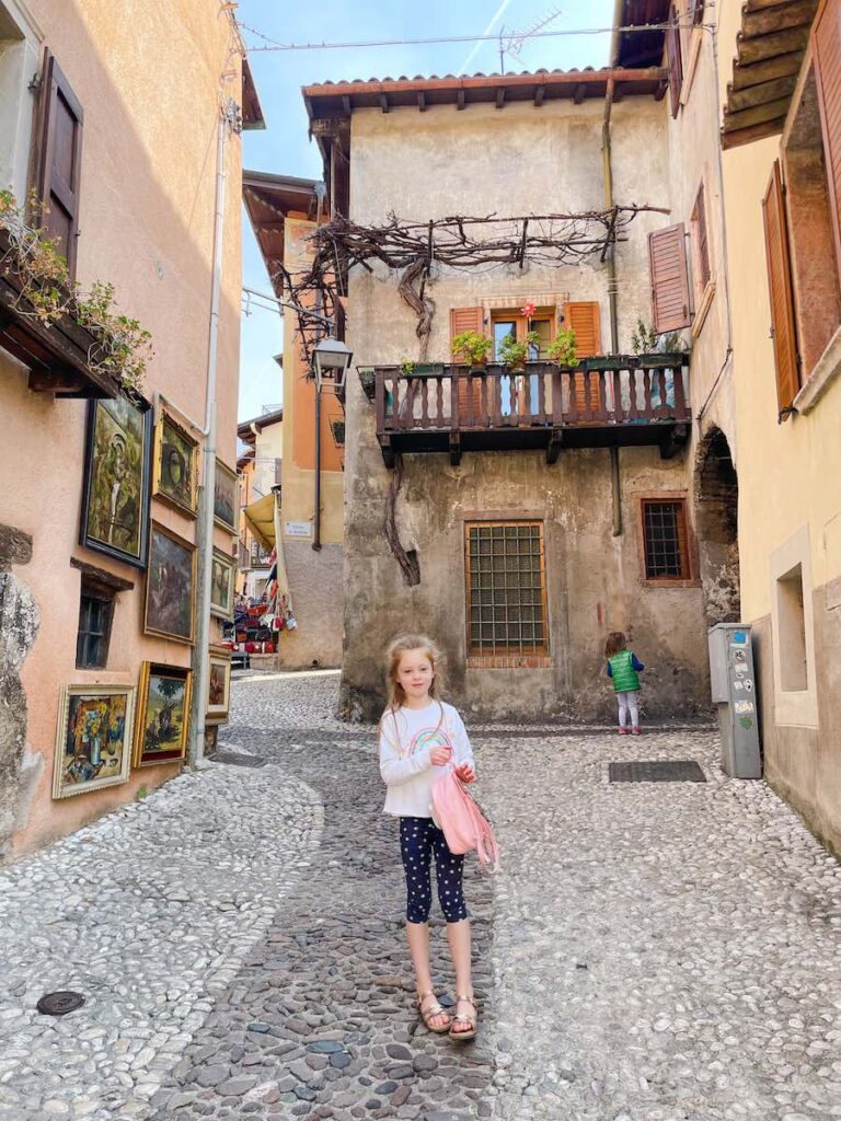 Girl standing in Malcesine street