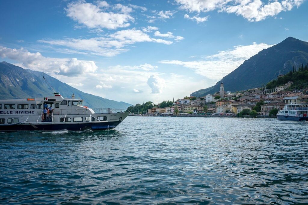 Boat travelling across Lake garda from Malcesine to Limon