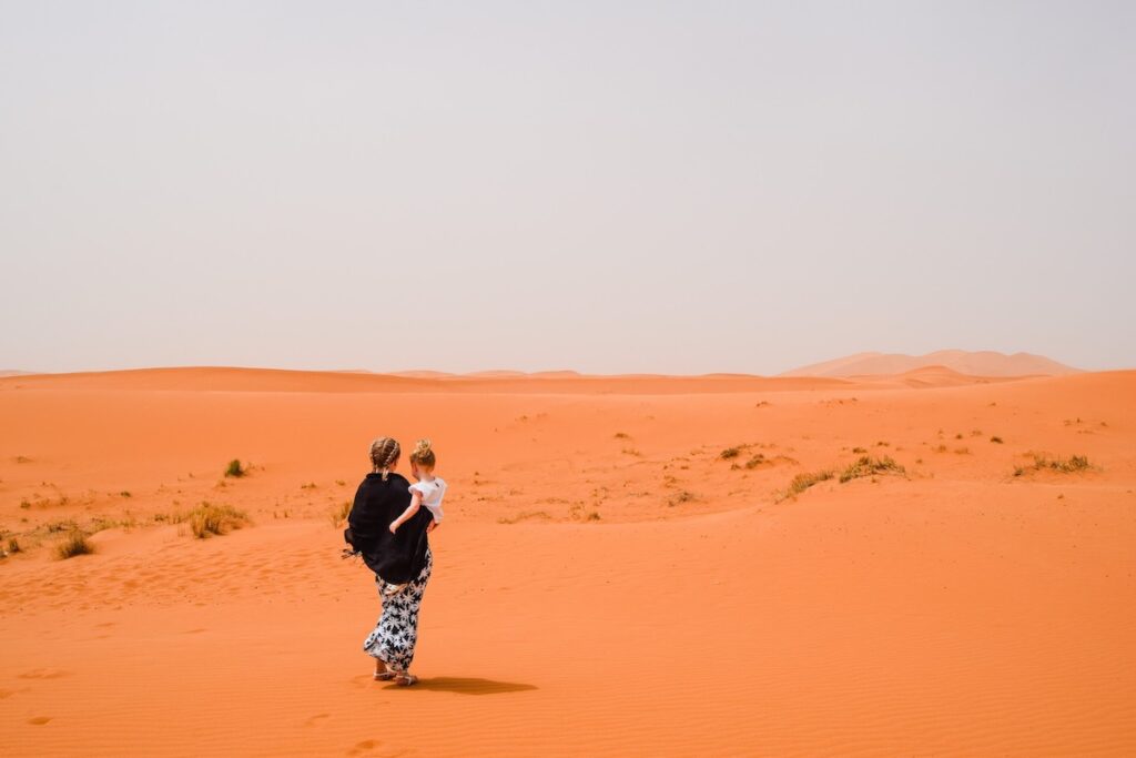 Mother and child in the Sahara Desert