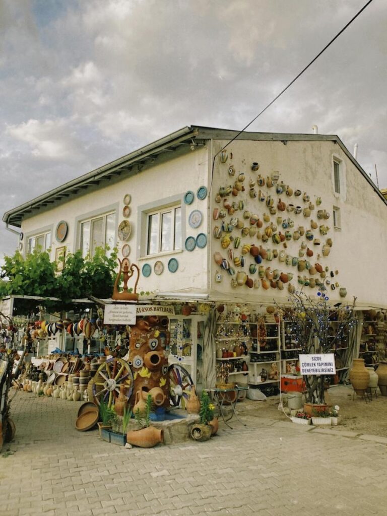 House with ceramic pots displayed on its exterior