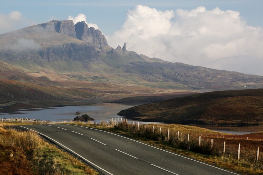 Scenic road winding through the landscapes of the Isle of Skye, Scotland.