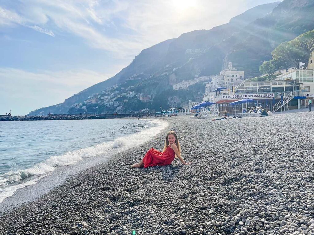Child enjoying a beach day on the Amalfi Coast in Italy.