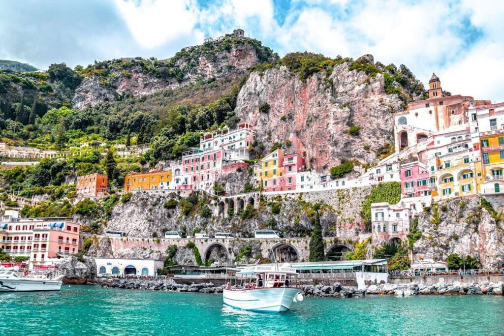 Colourful houses stacked along the Amalfi Coast in Italy.